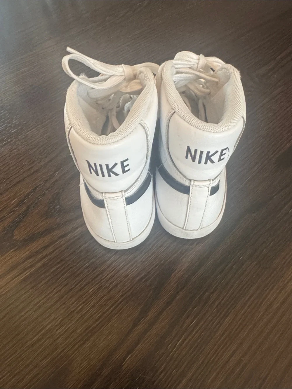 Nike High-Top Blazer Sneakers in White with Black Swoosh